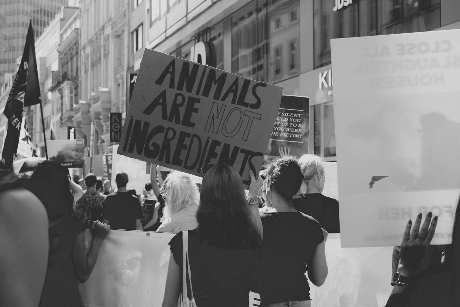 grayscale photo of people walking on street